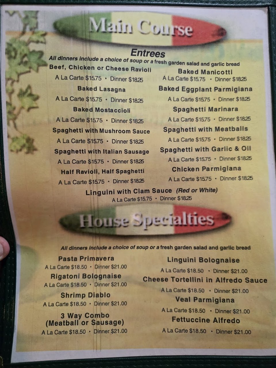 Menu page with pizza and hearty Italian dishes.